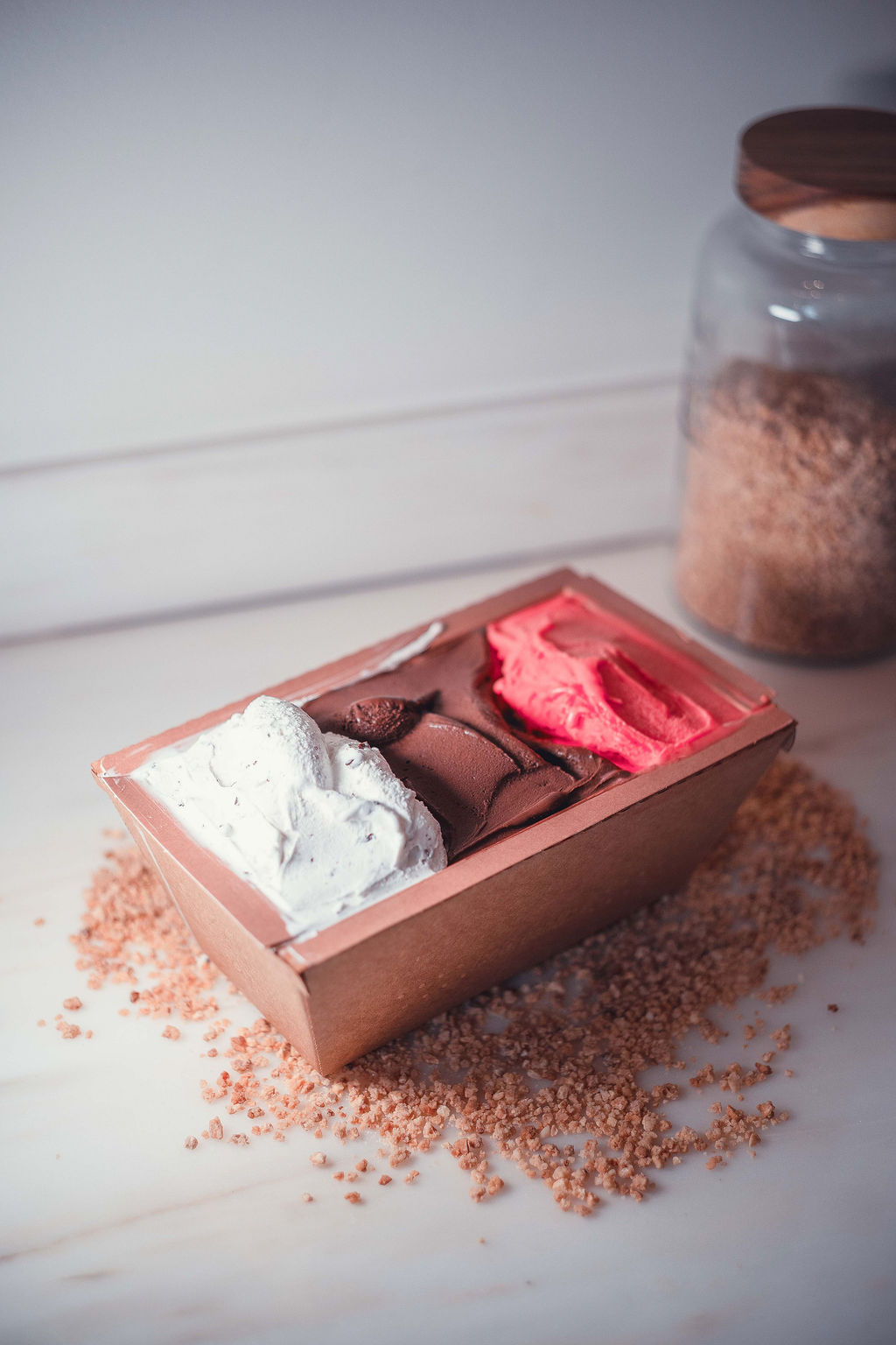 GIOLA compostable paper tub with three gelato flavours