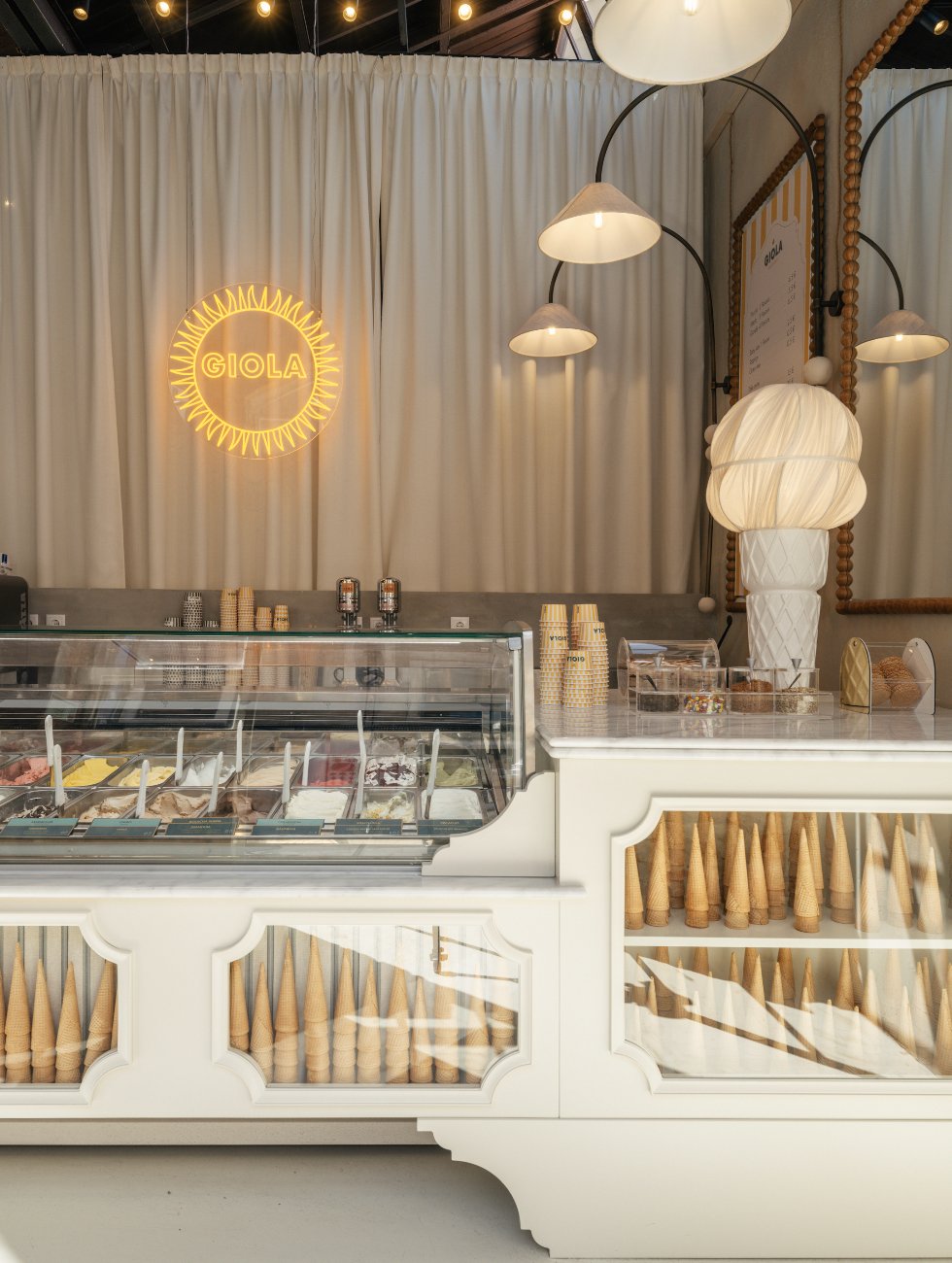 GIOLA LX Factory white counter with neon logo